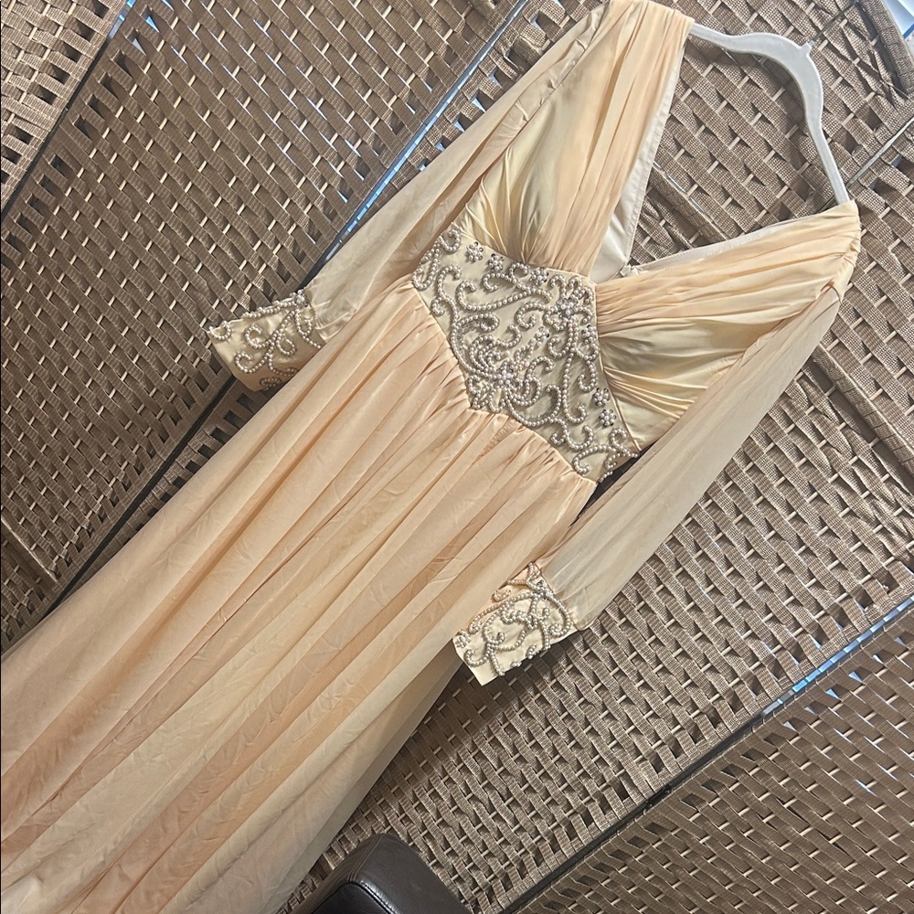 Elegant Cream Gown with Embellished Bodice